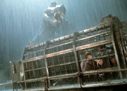 The Spinosaurus attacks the group.