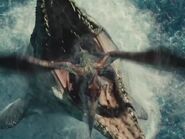 The Mosasaurus about to eat the Pteranodon. (Note: you can see Zara's arm beneath the Pteranodon)