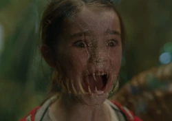  видит как отражение Индораптора слилось с её воедино и кричит от страха за свою жизнь и ужаса оттого, что они одинаковы; искусственные чудовища, неполноценные существа.