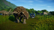 Apatosaurus in the background behind Ankylosaurus