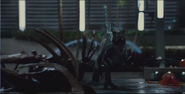 Blue charging toward Indominus rex