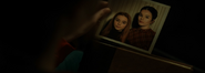 Photo of young Charlotte next to Iris Carroll