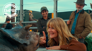 Ellie and Alan observing a baby Nasutoceratops