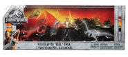 A Red Velociraptor and grey Gallimimus featured in the Kohls exclusive Jurassic World: Fallen Kingdom set