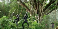 Meyers (far left) and another trooper hurled into the foliage by the Indominus' tail.