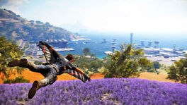  using the wingsuit in a JC3 promotional screenshot.