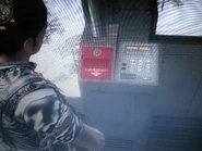 The interior of one at Kastelo Singa Military Base. The word "EMERGENCY" and some keycode are inside. Obviously on some automated system since Rico cannot access these.