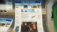 Close-up shot of a newspaper, from gun aiming.