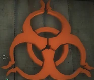 Bio-hazard symbol.jpg (96 KB) A biohazard symbol, located on the rig in the lake. It differs from the real biohazard symbol a little. The little most outward components don't exist on the real symbol and the small hole in the center should also be bigger.
