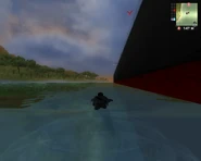 JC1 Tanker (Rico swims on its right side).png (1.02 MB) Rico swims on its right side. The ship is so big that it's actually stuck there. The surrounding rivers are not actually deep enough either. The ship could likely float if it were completely empty.