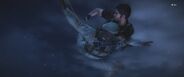 A deceased Marshall freefalling with Rico retrieving his PDA.