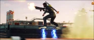 Rico is flying on the hoverboard. The weapon on his back is the new Stormalong EM Zero.