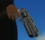 In Rico's hand.