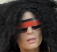 Véronique wearing P1's wig and visor