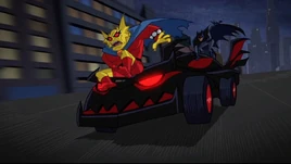 Etrigan and Batman ride the enchanted Batmobile.