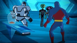 The Justice League stands between Brainiac and the bottled city.