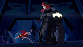 Plastic Man rubber-necks as Poison Ivy goes by