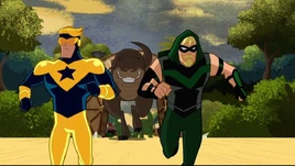 Booster inflicts his Jurassic lark on Green Arrow.