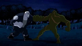 Grundy and Swamp Thing battle in the moonlight
