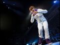 Jusitn Bieber showing a heart My World Tour