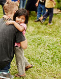 Justin hugging girl Pencils of Promise