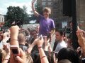 Justin Bieber waving to the crowd in London