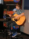Justin Bieber playing guitar at 96.5 KISS FM