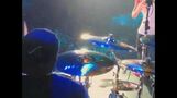 Melly Baldwin drumming during “Never Say Never”