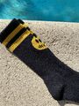striped mascot socks- black/golden $12