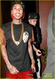 Tyga and Justin Bieber at a restaurant