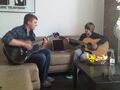 Justin and Michael Alexander playing guitar