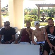 Justin Bieber with basketball players