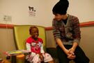 Justin Bieber with a young fan at Children's National Medical Center