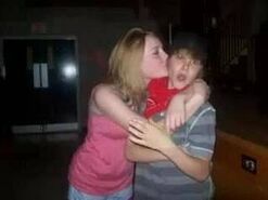 Girl kissing Justin Bieber in Restaurant restaurant