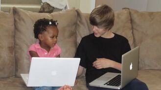 Justin Bieber on his MacBook