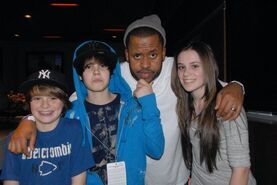 Justin Bieber with Christian, Kenny and Caitlin