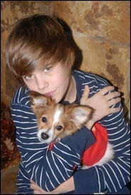 Justin Bieber holding Sammy