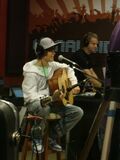 Justin playing guitar Kidd Kraddick in the Morning 2009