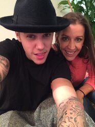 Justin Bieber with his mom July 2014