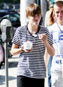 Smiling Justin eating frozen yogurt