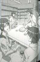 Kusuhara eating with others.