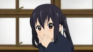 Azusa in shock over finding out her senpais all passed their exams.