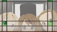 Tsumugi, Yui and Ritsu spy on Mio.