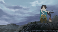 Mio trying to come up with new lyrics at a seashore.