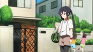 Azusa bringing a watermelon over to the Hirasawa household.