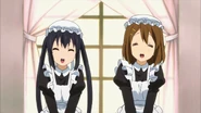 Yui and Azusa in maid outfits.