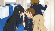 Mio and Yui headbang