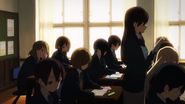 A sleepy Yui in her class.