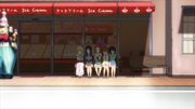 The club members laugh after seeing Mio's failed photos.