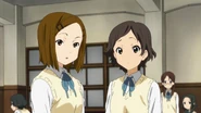 Ushio and Keiko lamenting the fact that Yui Hirasawa wears her normal uniform again.